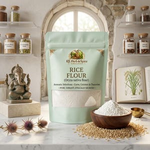 May include: A light green stand-up pouch of KE Herb & Spice Rice Flour with a clear window, featuring text including Oryza sativa flour, Aromatic Selections, and Pure, Vibrant, Ethically Sourced. A wooden bowl of white flour sits on a pile of grains.