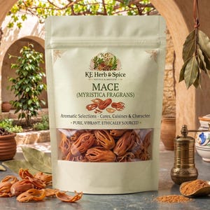 May include: A light beige stand-up pouch of KE Herb & Spice Mace (Myristica Fragrans) with a clear window showing dried reddish-brown mace blades. The label features the brand name, product name, and the text Aromatic Selections - Cures, Cuisines & Character - Pure, Vibrant, Ethically-Sourced.