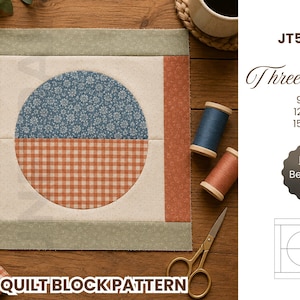 May include: A square quilt block pattern featuring a central circle divided into a blue floral half and an orange gingham half, framed by cream, orange, and sage green borders. Text includes JT5051, Three sizes, 9.5 inch, 12.5 inch, 15.5 inch, Level Beginner, and QUILT BLOCK PATTERN.
