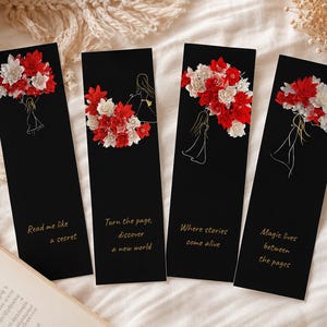 Op de afbeelding: Vier rechthoekige zwarte bladwijzers met gouden lijntekeningen van een persoon die een boeket rode en witte bloemen vasthoudt. Elke bladwijzer bevat unieke tekst: Read me like a secret, Turn the page discover a new world, Where stories come alive en Magic lives between the pages.