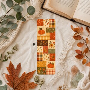 Autumn patchwork bookmark featuring pumpkins, yellow sunflowers, brown leaves and plaid squares in shades of orange, green and golden yellow.