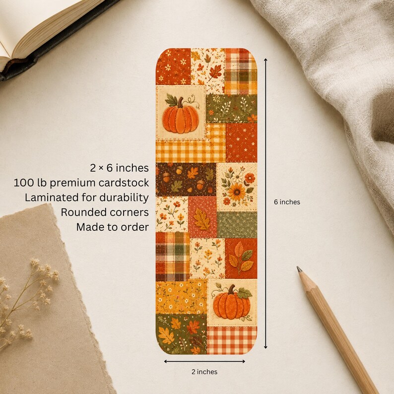 Fall patchwork bookmark shown with 2 by 6 inch measurements and product details for 100 lb cardstock, lamination, rounded corners and made-to-order construction.