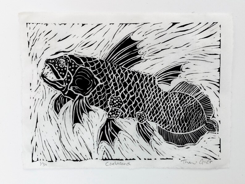Black and white relief print of a coelacanth fish swimming through textured water marks. 
Printed on hand torn deckle edged Wenzhou paper. Features detailed scales, lobed fins, and hand-penciled signature and edition details along the bottom margin.