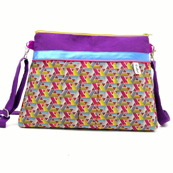 sac bandouliere femme violet a motifs graphiques multicolores , pochette zippée en toile et tissu ethnique , sac a main plissé