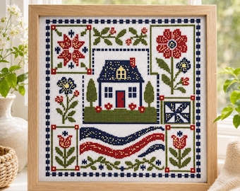 Puede incluir: Un cuadro de punto de cruz que muestra una casa central con puerta roja, rodeada de motivos florales, patrones geométricos y líneas onduladas rojas y azules, bordado con hilo rojo, azul, verde y amarillo sobre una tela de color blanco.