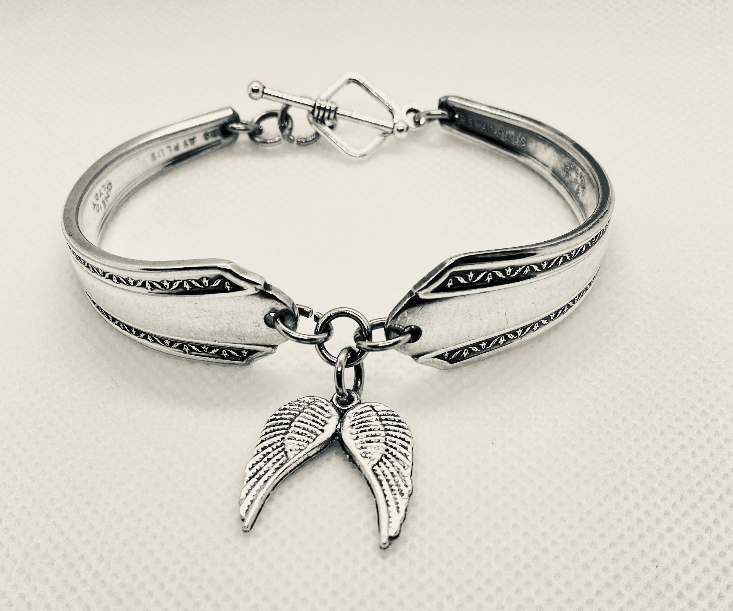 FOURSEVEN® Angel Wing Charm Pendant - Fits in Bracelet and Necklace - 925  Sterling Silver Jewellery for Men and Women (Best Gift for Him/Her) :  Amazon.in: Fashion