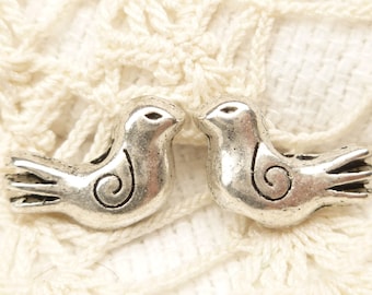 Cuentas espaciadoras de pájaro alado en espiral, plata antigua (10) - S138