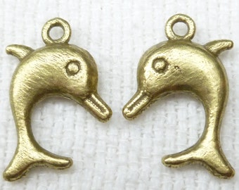 Antiqued gold tone Dolphin Fish Charms (8) - A26