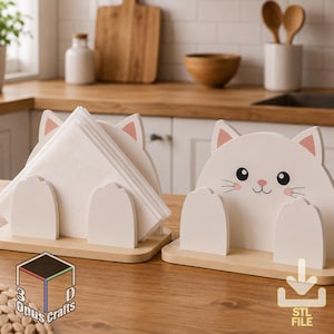 Pode incluir: Dois porta-guardanapos de madeira em forma de gato branco. Cada suporte apresenta um rosto de gato estilizado com orelhas cor-de-rosa, olhos pretos, um nariz pequeno e bigodes, além de dois suportes em forma de pata numa base de madeira clara.
