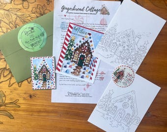 May include: A craft kit featuring a Gingerbread Cottage letter, a colourable gingerbread house illustration, a small card with a gingerbread house painting, a circular sticker with text, and a green envelope with a round You're Invited sticker.