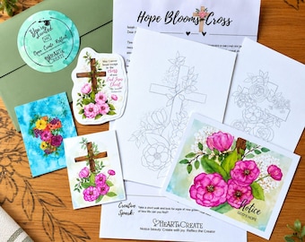 May include: A collection of paper items including a green envelope, a circular sticker, two floral cross stickers, two colouring pages with cross designs, and two printed cards featuring pink flowers and the text Notice God's Hope.