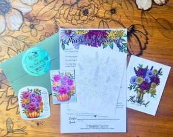 May include: A stationery set featuring a green envelope with a circular sticker, a Thankful Bouquet card, a small floral print, a line art colouring page, and a Thankful God is Good card, all displaying colourful flower illustrations and text.