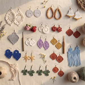 May include: A collection of various crochet earrings in diverse shapes and colors, including leaf, flower, star, and geometric designs. The set features pairs of earrings with metal hooks, alongside two wooden crochet hooks and balls of yarn.