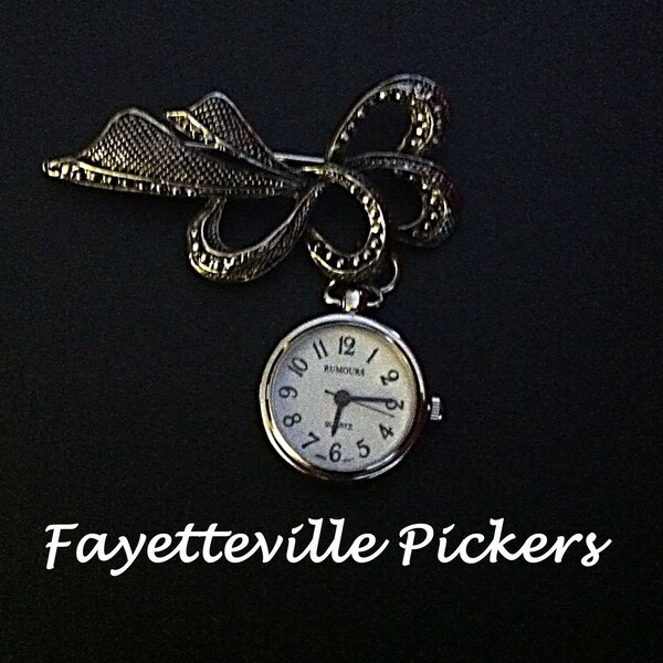 FREE 1st Class Shipping in USA. Beautiful Silver Tone Bow Pin Watch.  Excellent Condition