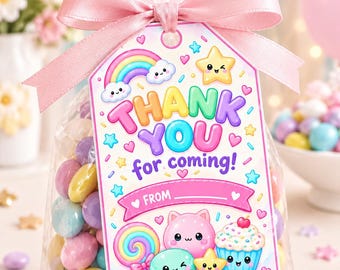 May include: A clear plastic treat bag filled with pastel-colored candies, tied with a pink satin ribbon and a rectangular tag. The tag features a rainbow, stars, a cupcake, a macaron, and the text THANK YOU for coming! with a FROM line.