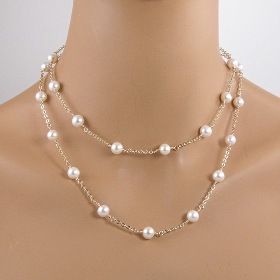 Long single shop strand necklace