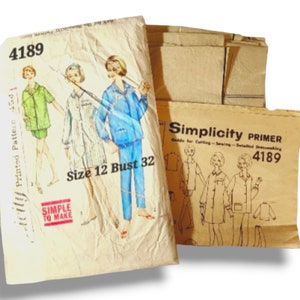 May include: A set of three ceramic mugs with a speckled, matte finish. The mugs are in shades of cream, light brown, and dark brown. Each mug has a simple, minimalist design, perfect for coffee or tea.