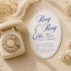 May include: An oval-shaped wedding sign with blue text and a rotary phone illustration. The text reads: Ring Ring, You've reached the Naslands... We can't come to the phone right now, we're busy getting married! Pick up the phone, leave your well wishes after the tone, then hang up to save your message.