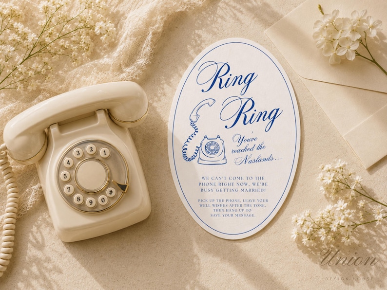 May include: An oval-shaped wedding sign with blue text and a rotary phone illustration. The text reads: Ring Ring, You've reached the Naslands... We can't come to the phone right now, we're busy getting married! Pick up the phone, leave your well wishes after the tone, then hang up to save your message.