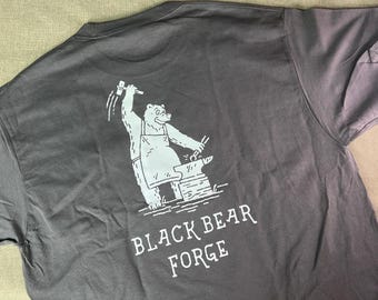 Black Bear Forge Tee shirt, bear working at the anvil