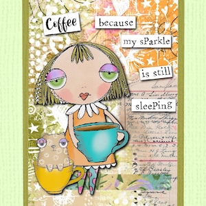 May include: A white ceramic mug with a black handle and the text "But First, Coffee" in a black, bold font. The mug is sitting on a wooden surface. The mug is approximately 4 inches tall.