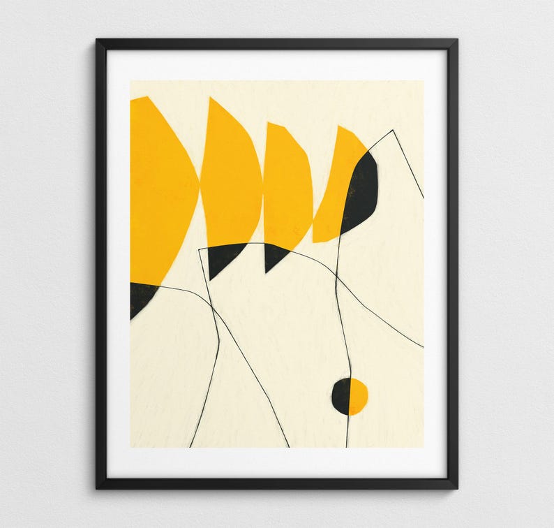The image is a framed abstract art piece featuring bold geometric shapes in yellow and black.