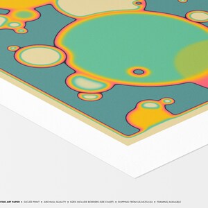 The image is a fine art paper with a vibrant abstract design featuring colorful circles and shapes in shades of green, yellow, and orange.