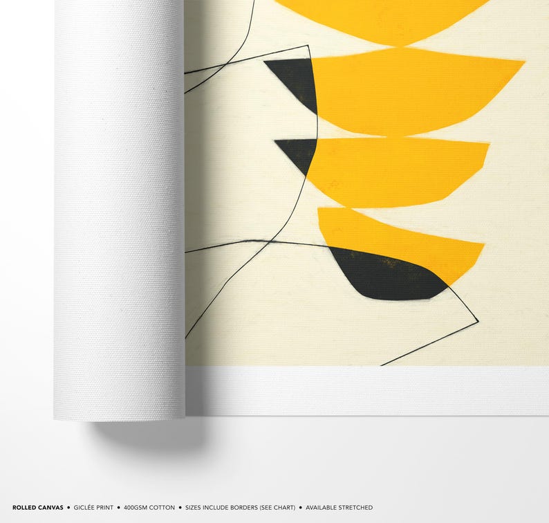 The image is a rolled canvas print featuring abstract geometric shapes in shades of yellow and black.