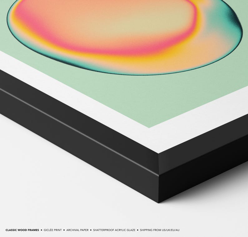 The image is a framed artwork featuring a vibrant abstract design with a gradient of colors, including pink, orange, and green, against a white background.