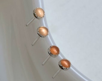 Sweet and Petite 3mm Peach Moonstone Stud Earrings Hand Crafted in Sterling Silver. Lightly hammer-textured and bezel set. Ready to ship!