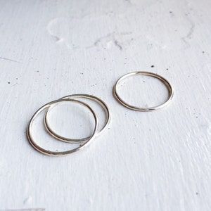 Hand-crafted Made to Order Sterling Silver Stacking Ring. This 1mm-wide band is petite and perfect for layering. Buy more and save!