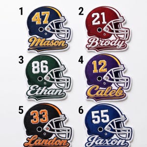 May include: Six embroidered football helmet patches labeled 1 through 6, each featuring a unique color scheme, a jersey number, and a name. The text CHOOSE YOUR DESIGN is at the top. The helmets are navy, maroon, dark green, purple, black, and blue.