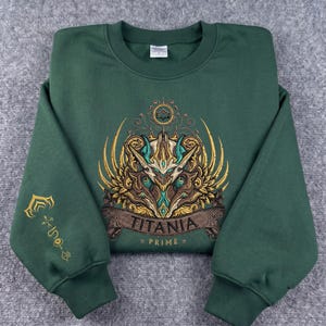 Titania Prime broderad tröja, Warframe-inspirerad luvtröja, sci-fi-spelkläder, premium anpassad spelmerchandise.