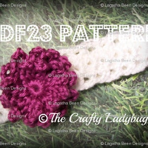 May include: A white crocheted headband with a pink crocheted flower attached. The headband is on a green grassy background. The text "PDF23 PATTERN" and "The Crafty Ladybug" are visible in the image.