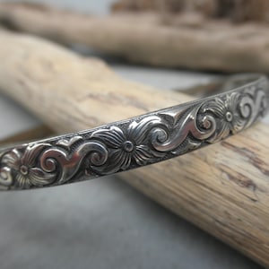 Oxidized flower pattern sterling silver bangle bracelet