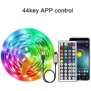 May include: A circular spool of multicolored LED light strips, a black USB power cable with a controller, a 44-key remote control, and a smartphone displaying an app interface. The text 44key APP control is visible at the top of the image.