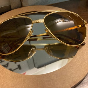 Vintage Hilton Sunglasses 24kt  new old stock
