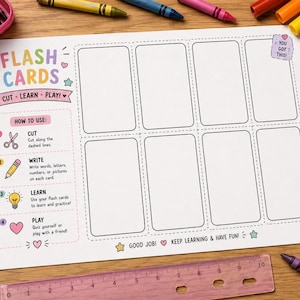 May include: A white paper sheet featuring a template for eight blank flash cards with dashed cutting lines. The page includes instructions labeled Cut, Write, Learn, and Play, decorated with colorful icons, stars, and hearts, plus the text Flash Cards.