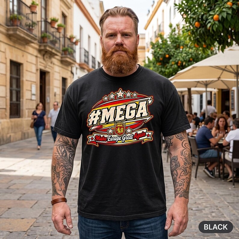 Bearded man in a European old town wearing the "#MEGA Make Europe Great Again" Spain T-shirt by SarcasmArt in Black.