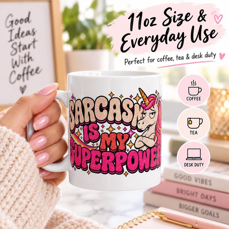 11 oz size and everyday use: a hand holding the "Sarcasm Is My Superpower" unicorn coffee mug by SarcasmArt – perfect for coffee, tea and hot chocolate.