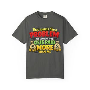 Pepper "That Sounds Like a Problem for Someone Who Gets Paid More Than Me" sarcastic coworker T-shirt by SarcasmArt on a white background.