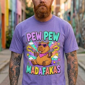 Bearded man in a colorful graffiti alley wearing the "Pew Pew Madafakas" capybara meme T-shirt by SarcasmArt in Violet.