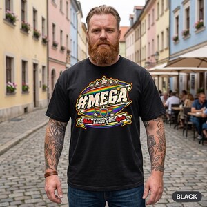 Bearded man in a European old town wearing the "#MEGA Make Europe Great Again" Rainbow Pride T-shirt by SarcasmArt in Black.