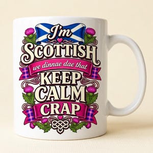 Close-up of the "I'm Scottish, We Dinnae Dae That Keep Calm Crap" funny Scottish mug by SarcasmArt: a Scottish saltire, purple thistles and pink tartan banners with the slogan I'm SCOTTISH – we dinnae dae that KEEP CALM CRAP.