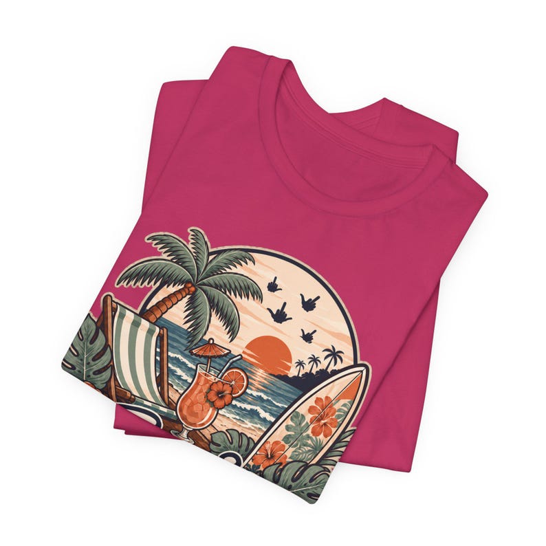 Folded raspberry pink "Ironia, Sarcastic Sea" retro beach T-shirt by SarcasmArt showing the retro sunset beach print – a fun summer gift for introverts.