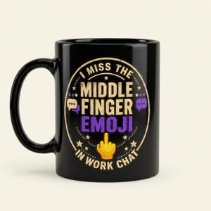 "I Miss the Middle Finger Emoji in Work Chat" black office coffee mug by SarcasmArt: glossy black 11 oz ceramic mug with a round retro badge reading I MISS THE MIDDLE FINGER EMOJI IN WORK CHAT with purple chat bubbles and a yellow emoji hand.