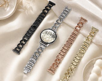 May include: A smartwatch with a round face displaying 11:49, attached to a silver-tone chain link band. Three additional watch bands are shown in black, rose gold, and gold tones, each featuring a decorative chain link design.