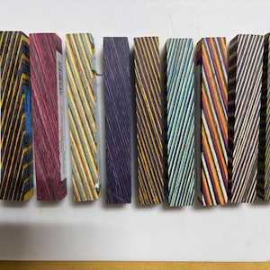 Color Grain colors in order:
1. Tropical - Green Purple
2 Midnight - Brown, White, Blue
3. Festival - White, Brown, Yellow, Red and Blue
4. Winter Garden - Blue, Lt Blue, White
5. Oceania - Blue, Black, Yellow
6. Tahoe - Purple and Grey
7. Southwest - Yellow, Green, White, Brown
8. Nightfire - Red, Black
9. Desert Rust - Purple, Yellow, Blue
10 Oasis - Green, Blue, Orange, Red, Lt Blue