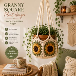 May include: A crochet plant hanger featuring a sunflower-inspired granny square pattern in cream, yellow, and dark brown yarn. The hanging basket holds a potted plant with trailing green leaves. Text on the image reads GRANNY SQUARE Plant Hanger.