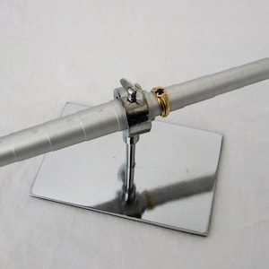 Double Sided Stepped Revolving Ring Mandrel On Base